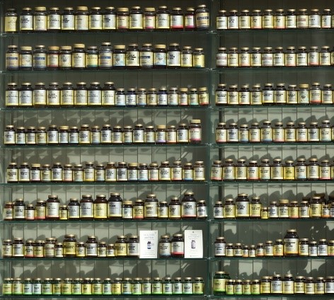 Various dietary supplement bottles on store shelves